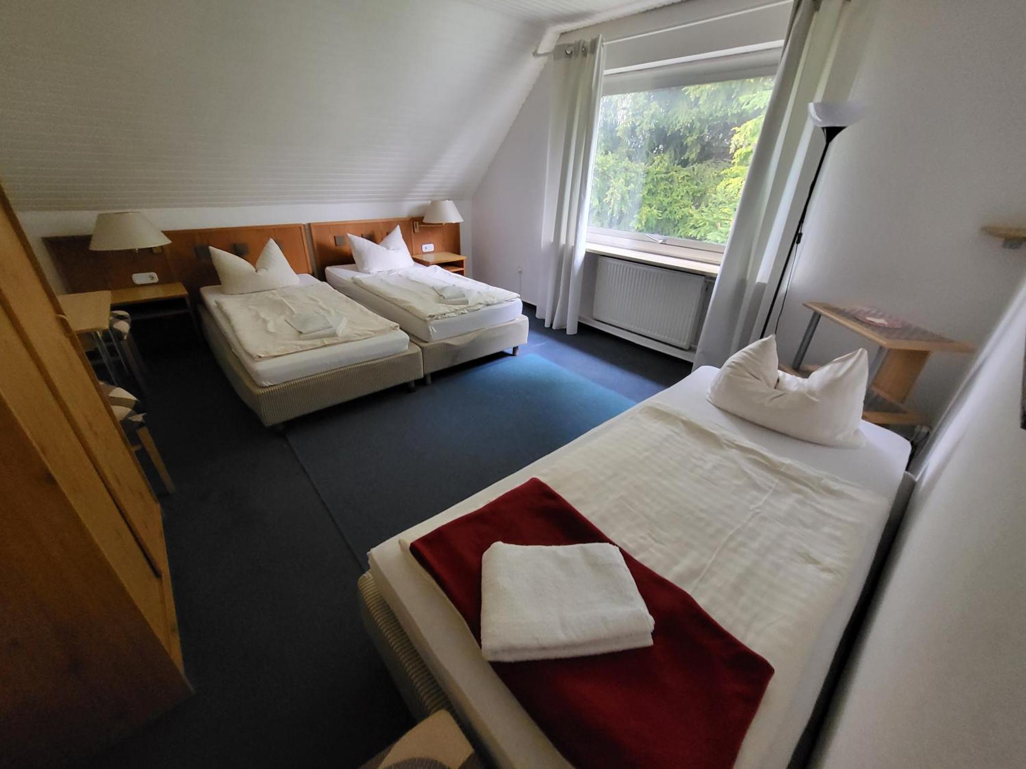 Dreibettzimmer